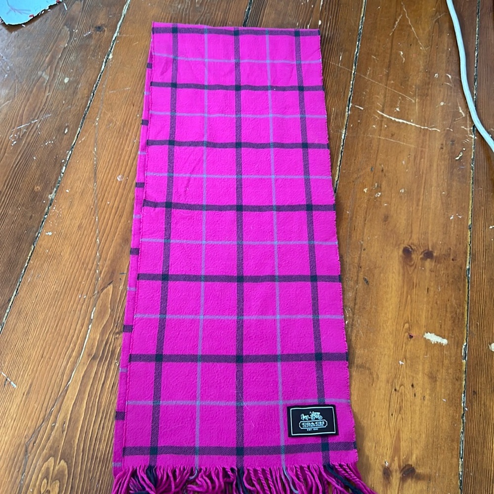 Selling a plaid pink coach scarf